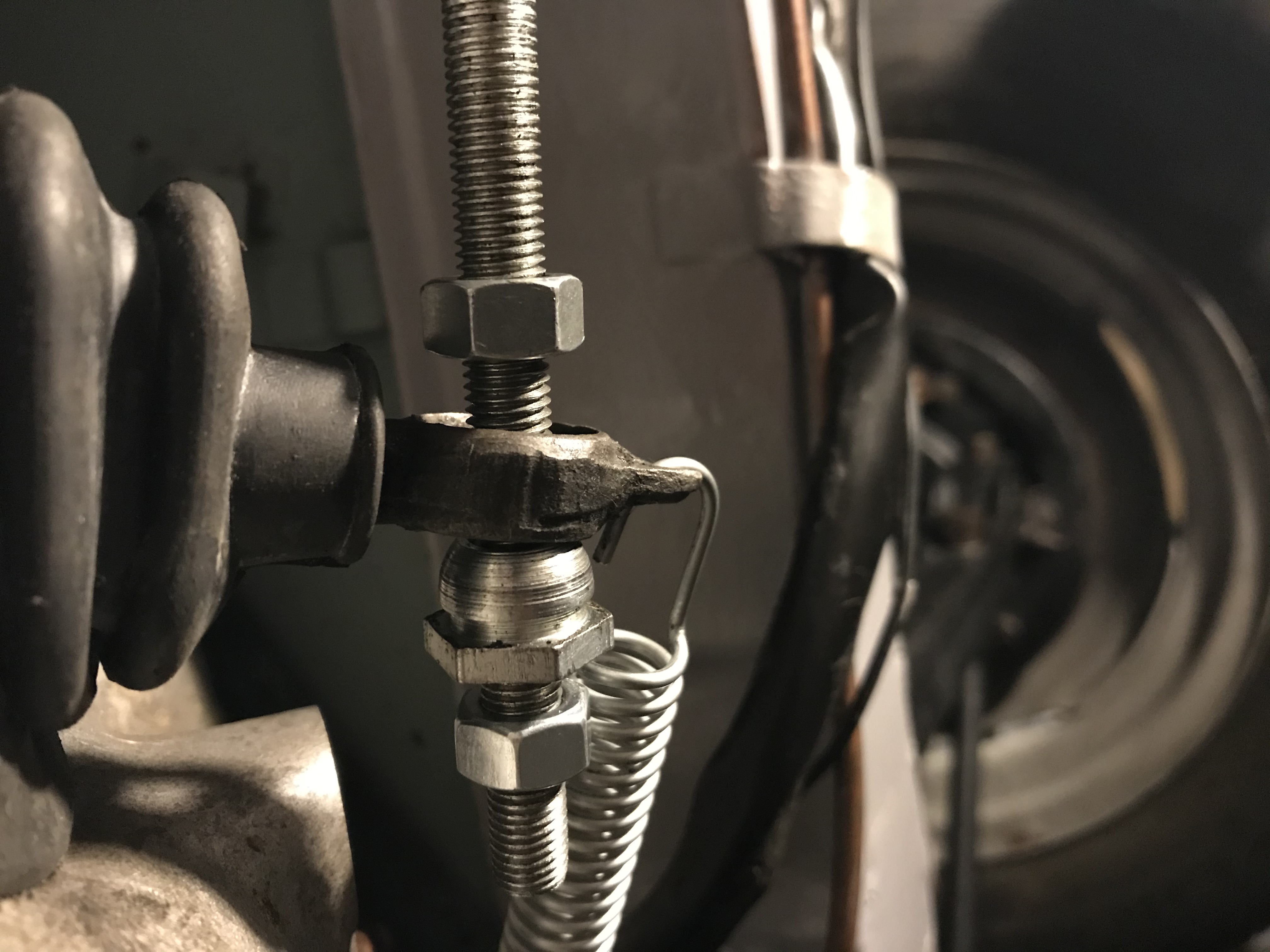 Image with domed nut spring side
