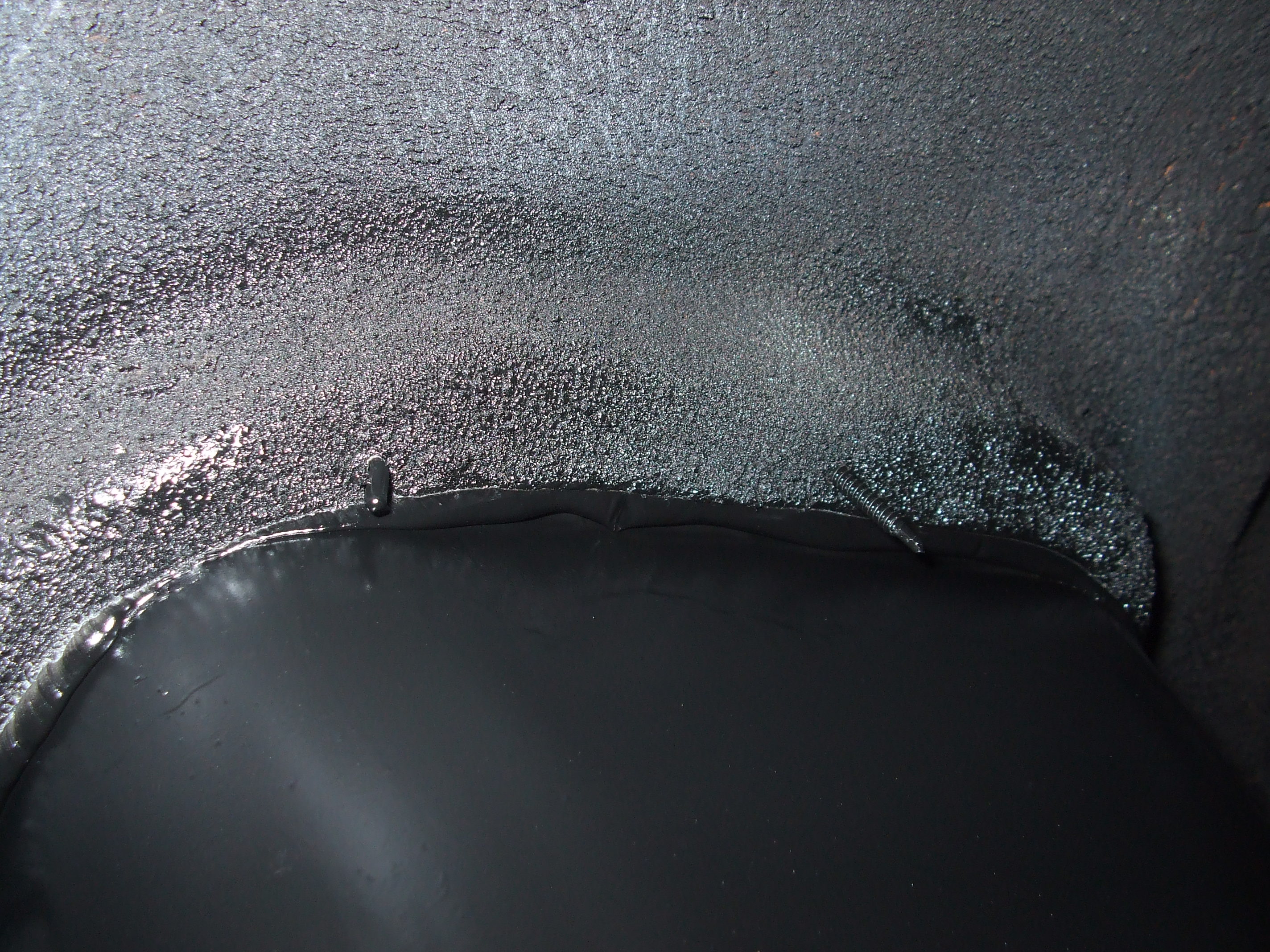 6. Sealant squeezing out to fill in the gaps.JPG