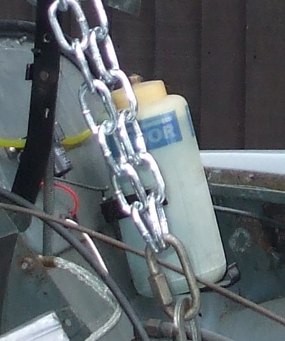 Relocated washer bottle.JPG