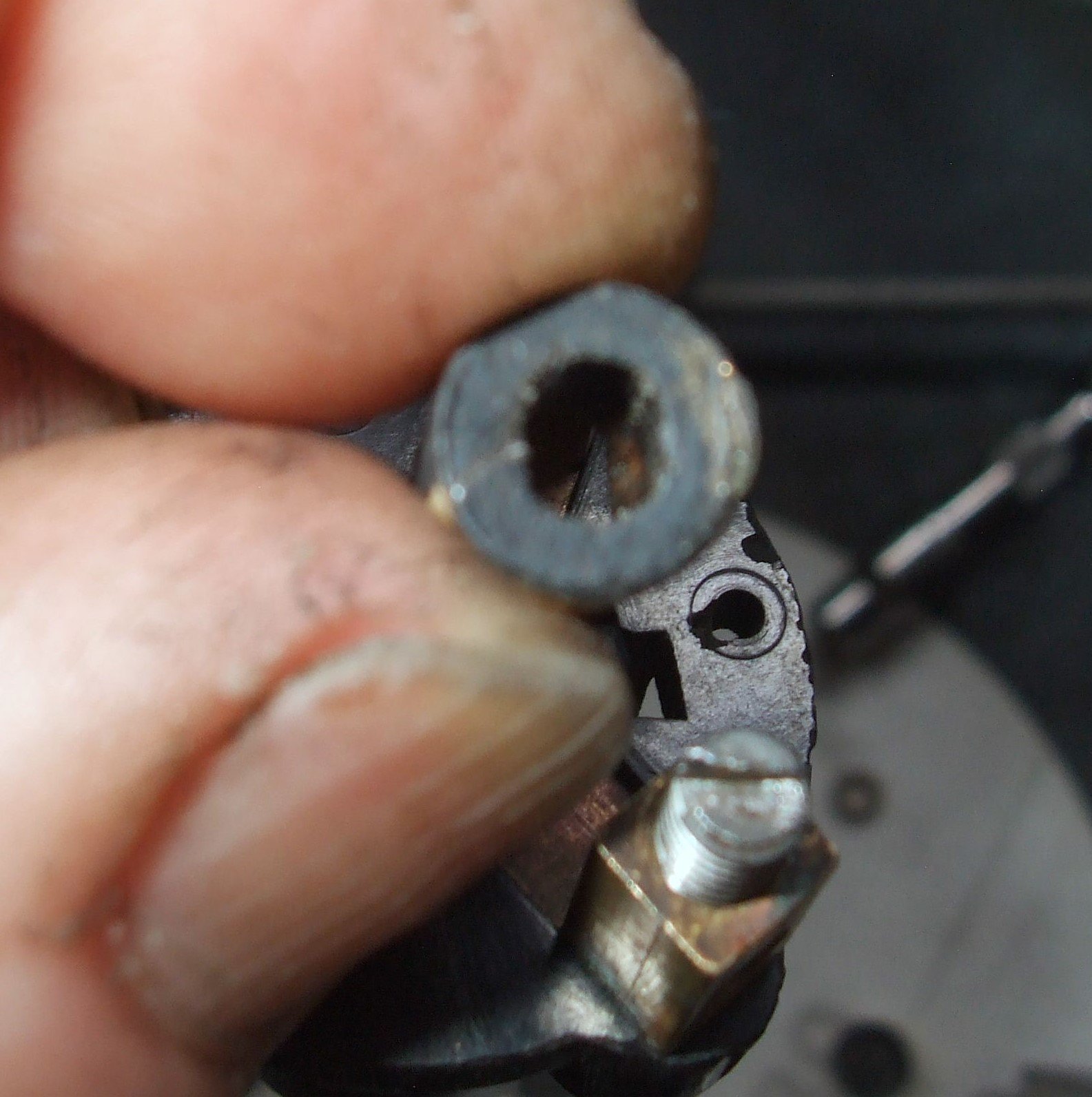 7 Control ring being reinserted -- brass face up -- bakelite (no contact) face down.JPG