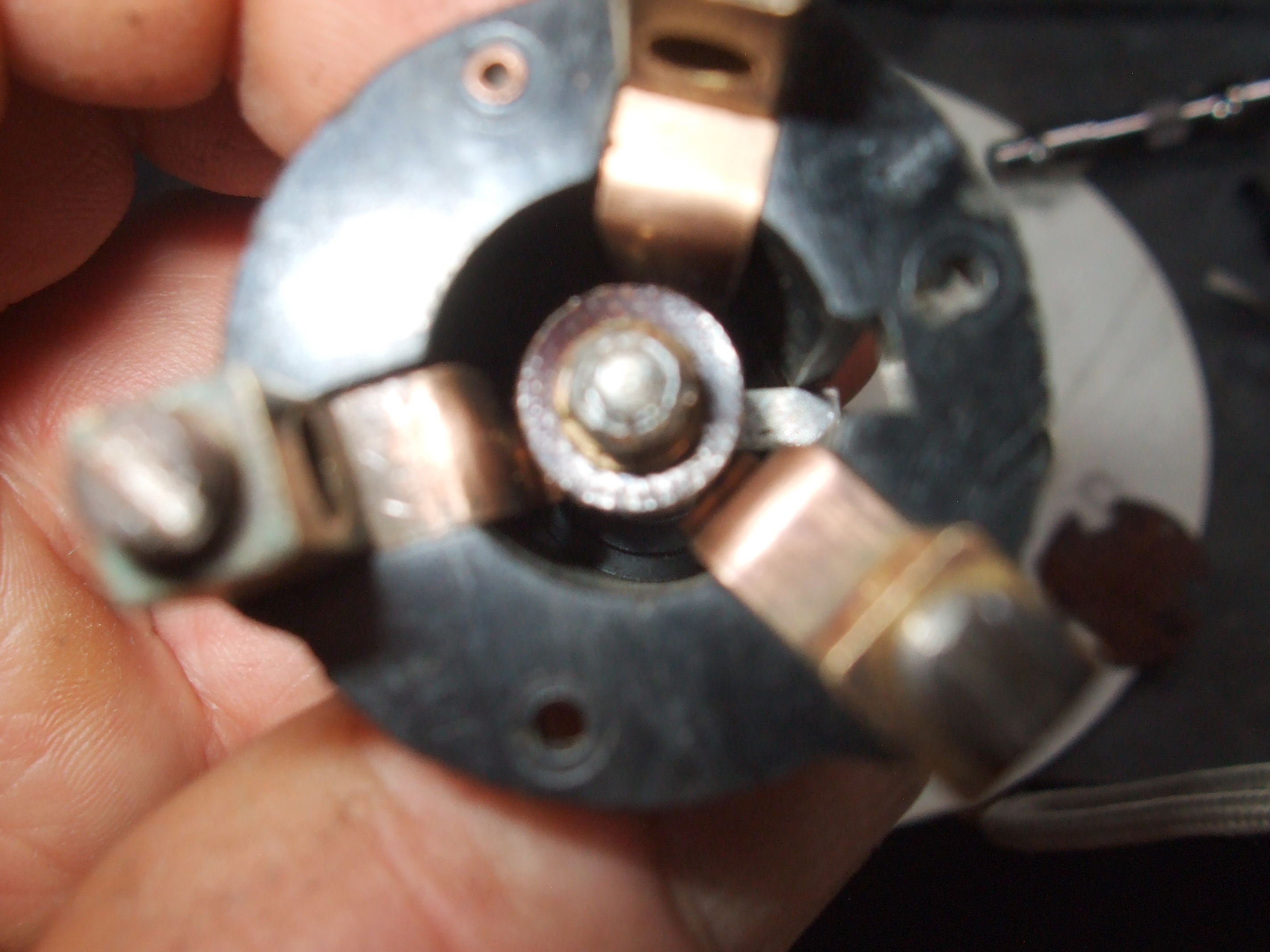8 Back together -- fibre washer first, brass washer second, then the  nut.JPG